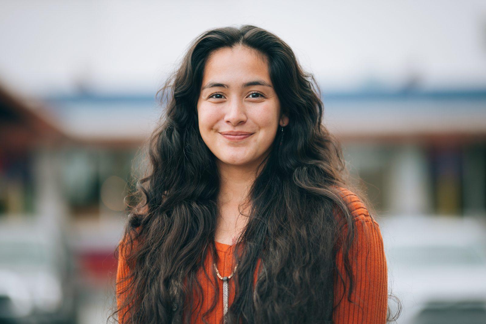 A portrait of a beautiful Indigenous Alaskan woman in the city of Anchorage, Alaska.